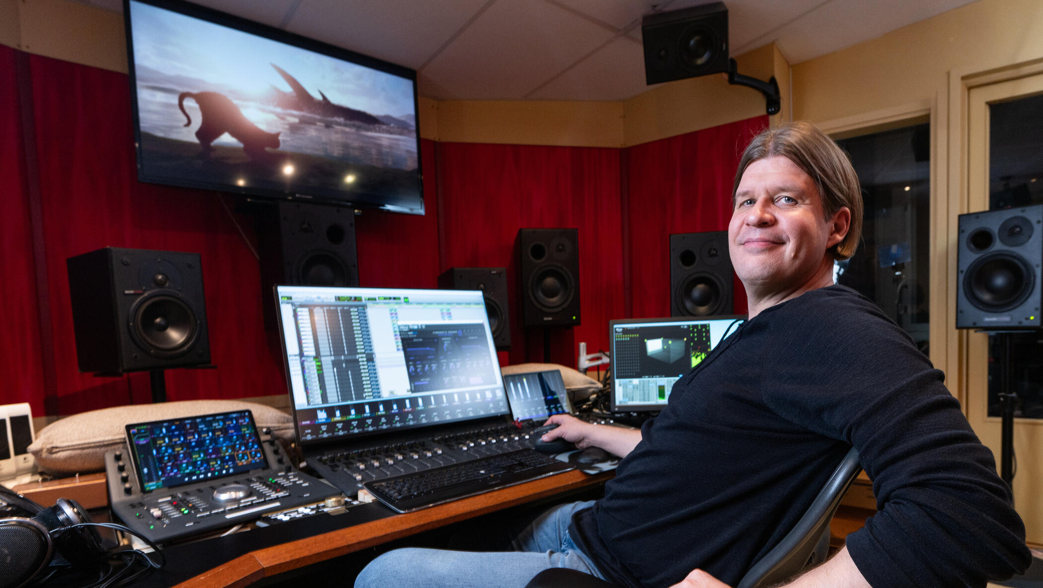 Mikko Raita mixing Oscar-winner Flow score at his Studio Kekkonen Dolby Atmos music mix room Mikko Raita mixing the Best Animated Feature Oscar-winning film Flow score at his Dolby Atmos music mixing control room in Studio Kekkonen, Helsinki - side pose